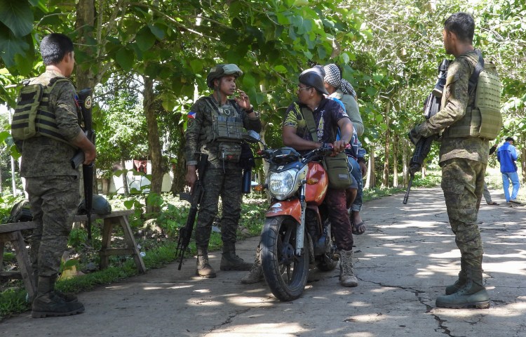 A file photo of Philippine military personnel manning a check point in Sulu province in the southern Philippines on May 12, 2025. Journalist RJ Nichole Ledesma was one of 19 people killed by the army in an anti-insurgency operation against alleged communist rebels on April 19, 2026.