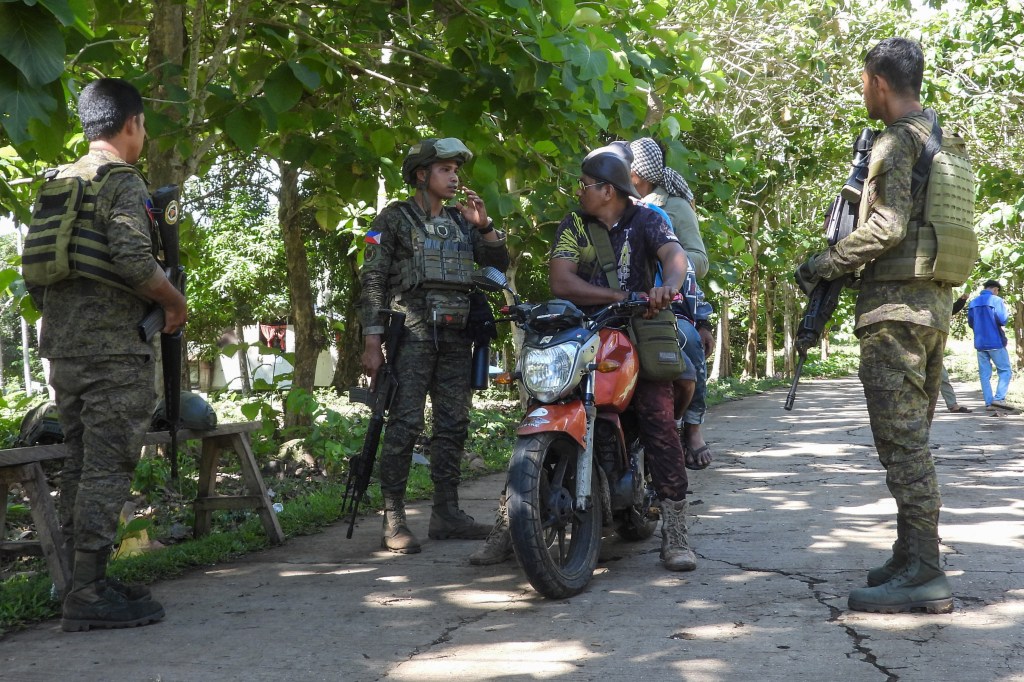 A file photo of Philippine military personnel manning a check point in Sulu province in the southern Philippines on May 12, 2025. Journalist RJ Nichole Ledesma was one of 19 people killed by the army in an anti-insurgency operation against alleged communist rebels on April 19, 2026.