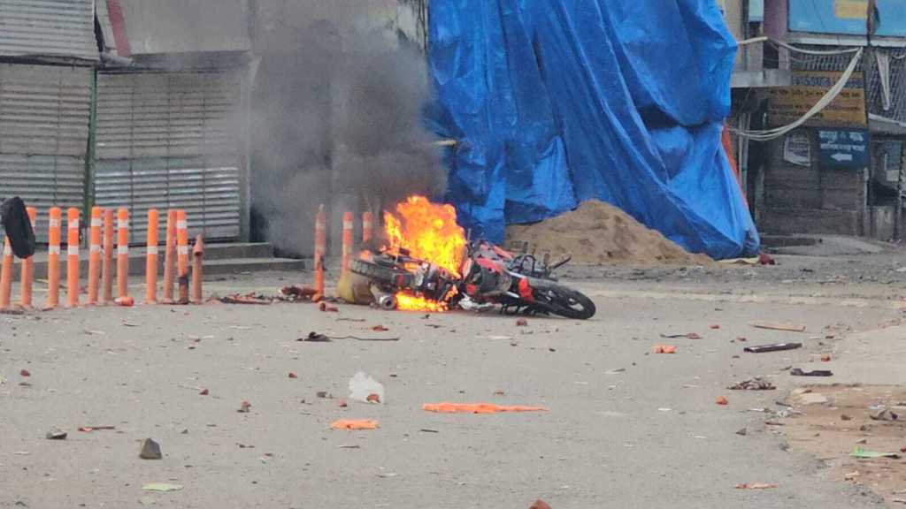 A motorcycle burns on a street in Suti, Murshidabad district, West Bengal, during protests against the Waqf Amendment Act in April 2025. The bike belonged to Maidul Islam, a journalist with the Bengali daily Dindorpon, who was covering the unrest when the mob set it alight. Photo: Maidul Islam