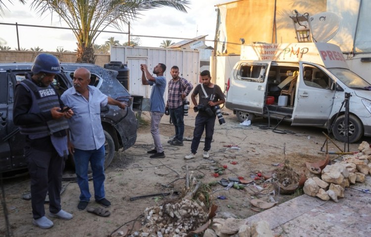 Civilians and members of the press