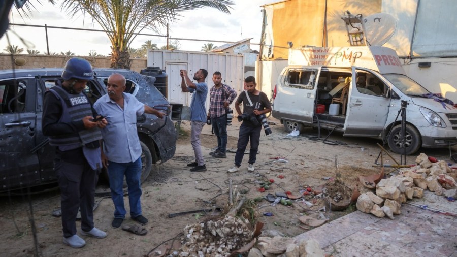 Civilians and members of the press