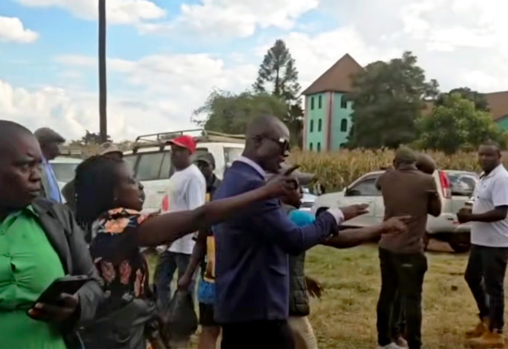 Suspected ZANU-PF supporters harass journalists on March 31 covering public hearings on the Constitutional Amendment Bill.