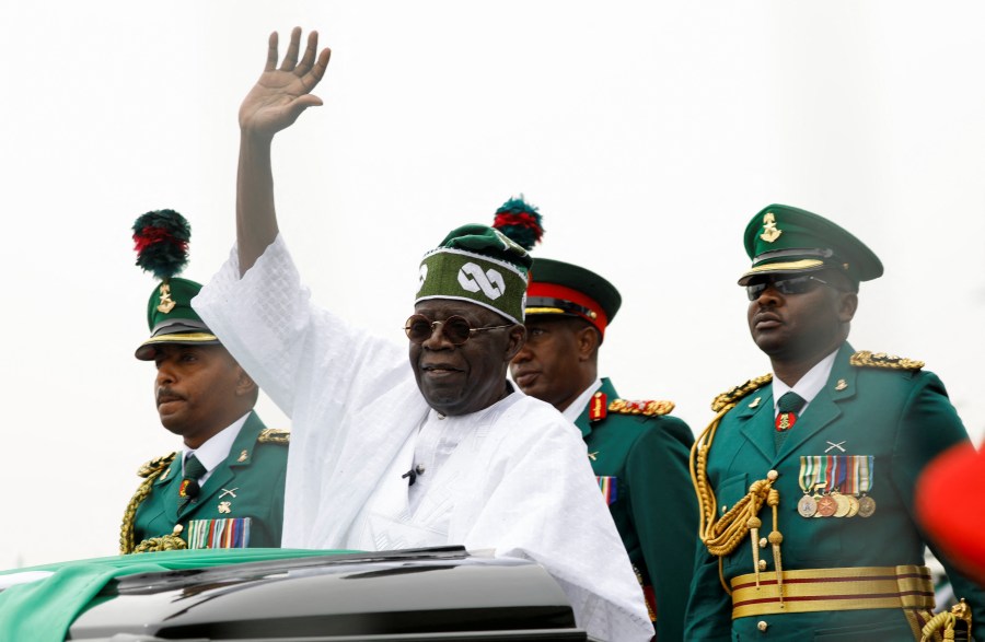 President Bola Tinubu waves during his swearing-in ceremony in the Nigerian capital, Abuja, on May 29, 2023.