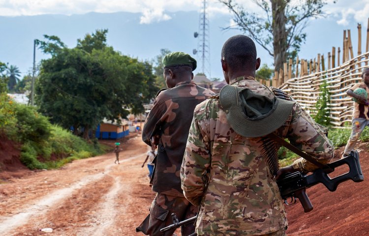 Government soldiers patrol a road in Fizi Territory in the eastern Democratic Republic of the Congo in January 2026.