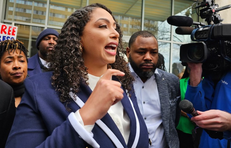 Minnesota-based independent journalist Georgia Fort speaks to reporters and supporters outside the federal courthouse in St. Paul, Minn., on Tuesday, Feb. 17, 2026, after pleading not guilty over her alleged role in a protest that disrupted a Sunday service at a Southern Baptist church in St. Paul, where an Immigration and Customs Enforcement official served as a pastor. (AP Photo/Steve Karnowski)