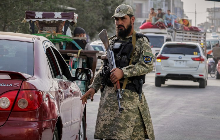 A Taliban policeman directs traffic in Kabul on August 14, 2025. Armed Taliban agents raided Tamadon TV’s headquarters in the city and forced the broadcaster off the air on June 23, 2026. (Photo: AP/Siddiqullah Alizai)