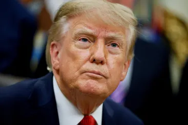 US President Donald J. Trump looks on as he makes an announcement on healthcare in the Oval Office at the White House in Washington, D.C., US, September 18, 2026. REUTERS/Evan Vucci TPX IMAGES OF THE DAY